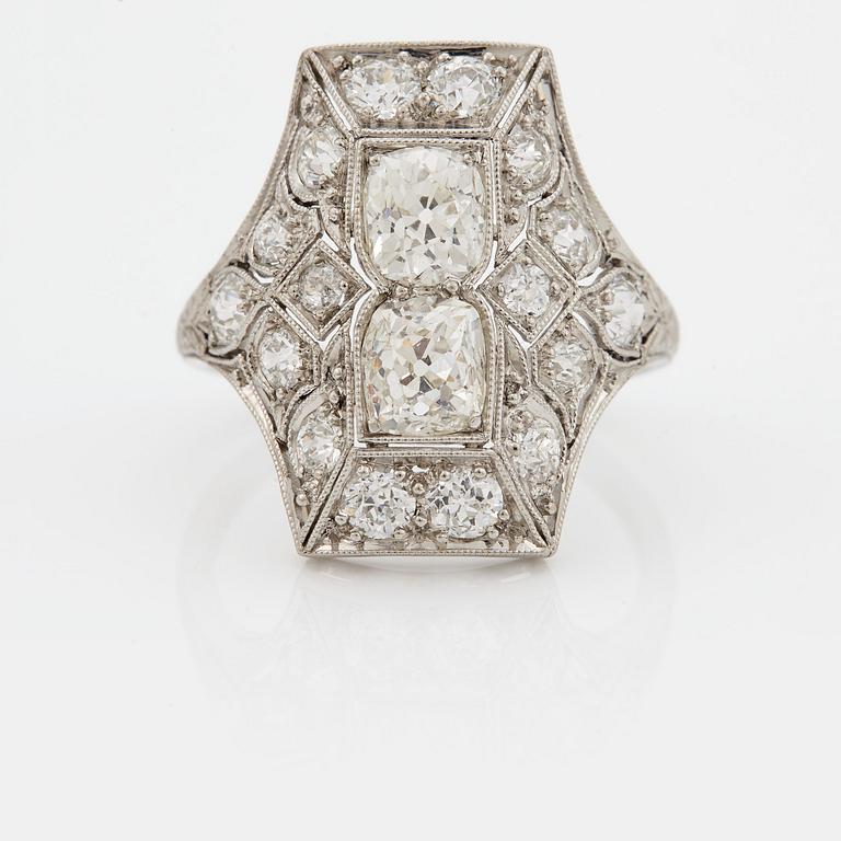 A RING set with old-cut diamonds.
