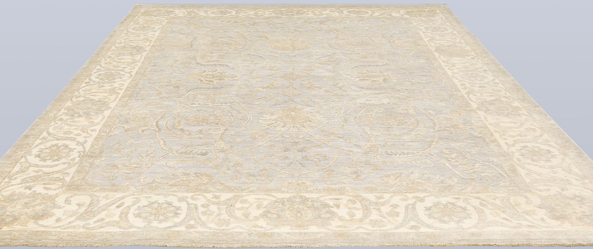 A Ziegler Design carpet, 347 x 276 cm.
