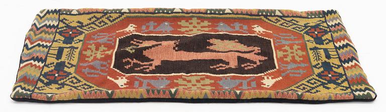 A cushion, flat weave, 74 x 47 cm, probably Skytts or Oxie district. Scania, circa 1900.