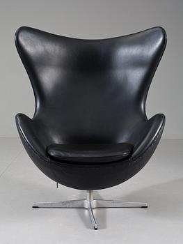 An Arne Jacobsen black leather and steel 'Egg Chair', Fritz Hansen, Denmark 2001.