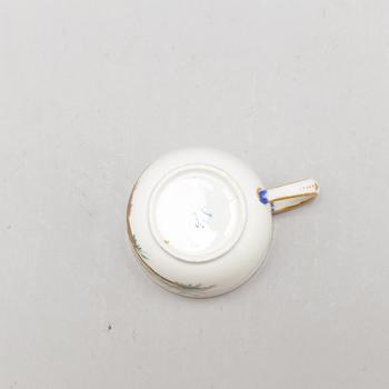 A pair of cups and saucers, "Sévrès"like mark, 19th century.