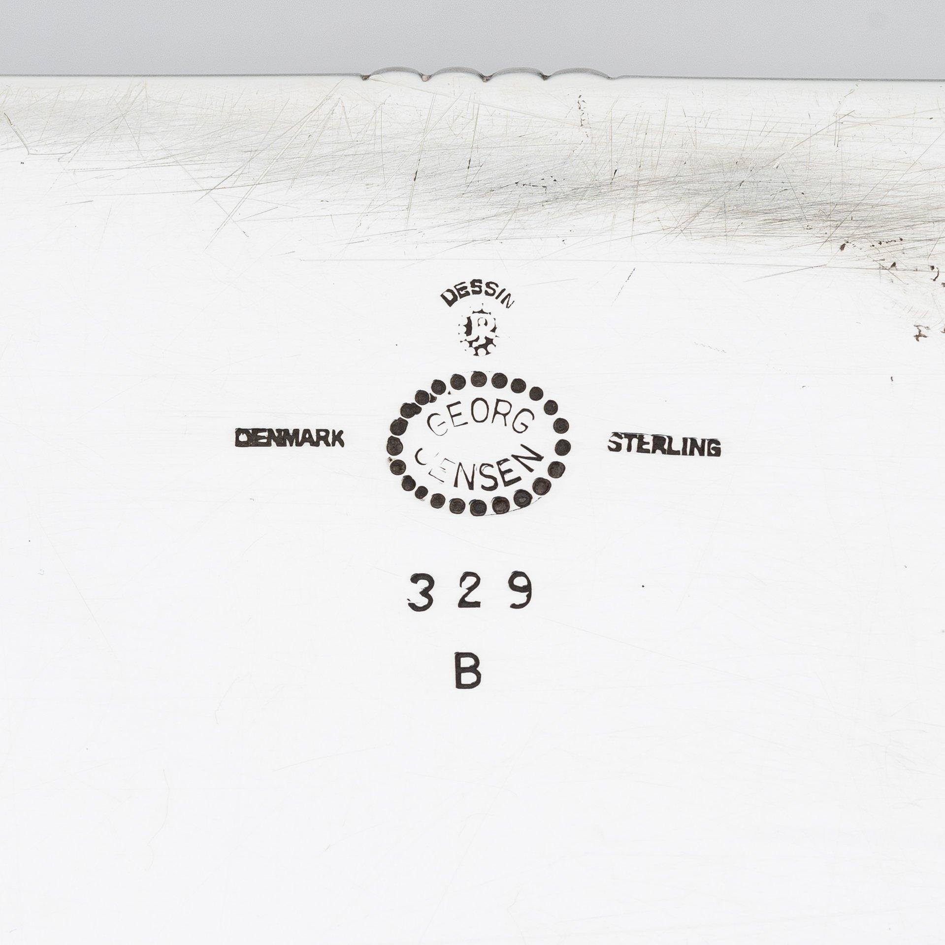 Johan Rohde, a sterling silver cigar box with wood interior, Georg Jensen, Copenhagen 1925-1932, design no. 329B.