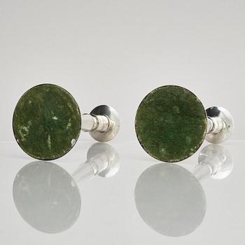 Two pair of early 19th century silver candlesticks, marks of Anders Lundqvist, Stockholm, Sweden 1819 and 1821.
