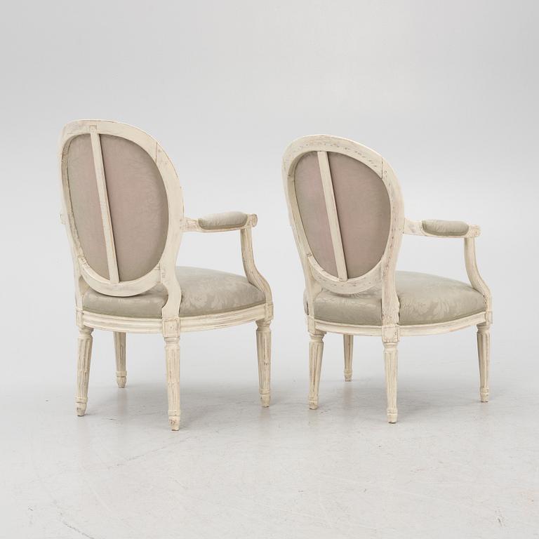 Two similar Louis XVI armchairs, France, late 18th century.