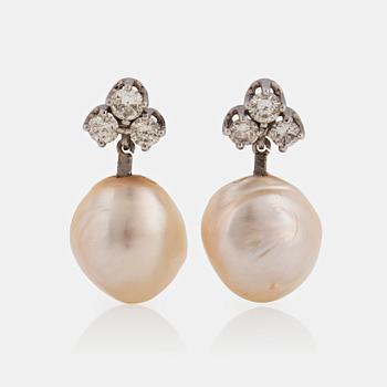 979. A pair of 18K white gold and cultured pearl earrings set with round brilliant-cut diamonds.