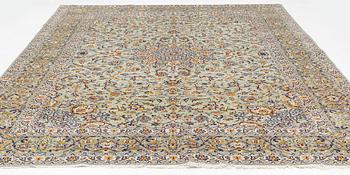 A Keshan carpet, signed, c. 410 x 297 cm.