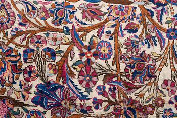 A carpet, semi-antik, silk Kashan, ca 315,5 x 204 cm.