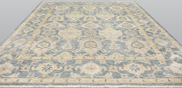 An oriental carpet, ca 425 x 300 cm.
