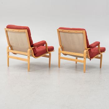 Bruno Mathsson, a pair of 'Ingrid' armchairs, Dux.