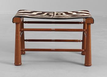 A Josef Frank mahogany stool, Svenskt Tenn, model 972.