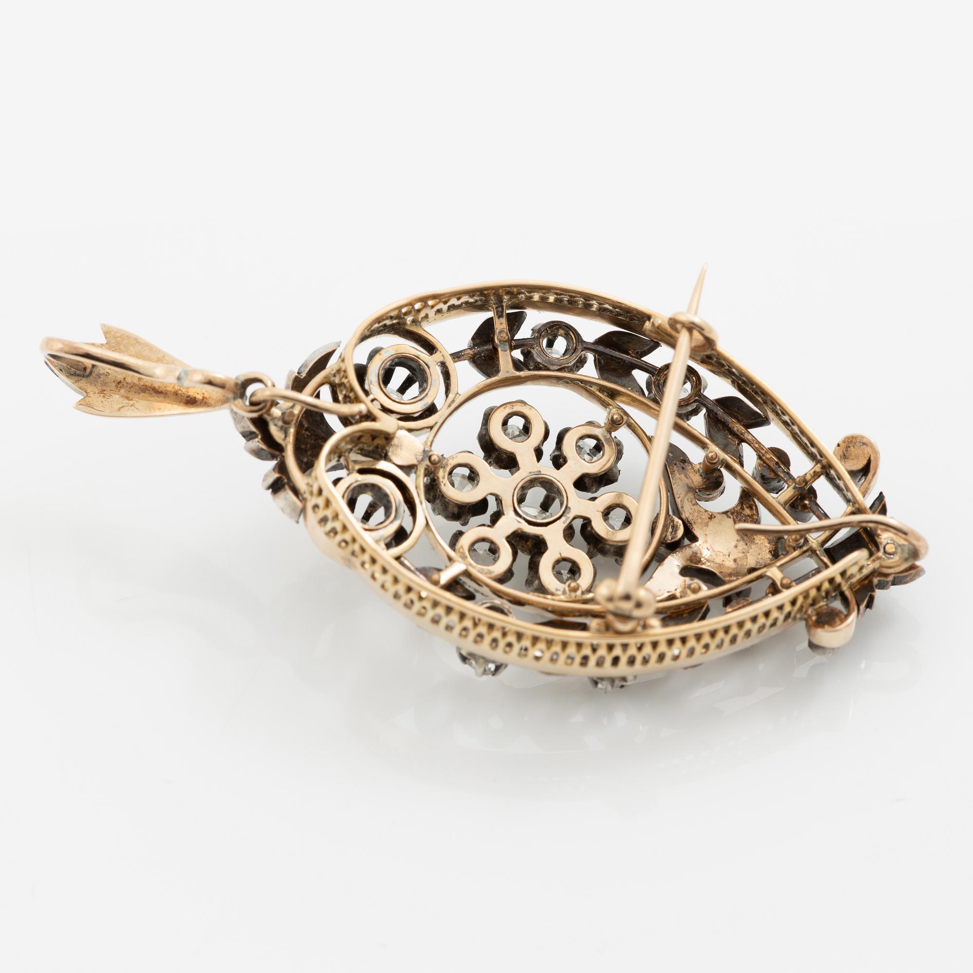 Brooch/pendant in 18K gold and silver set with old-cut and rose-cut diamonds, circa 1900.