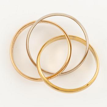 A Cartier "Trinity" ring 18K gold in three colours.