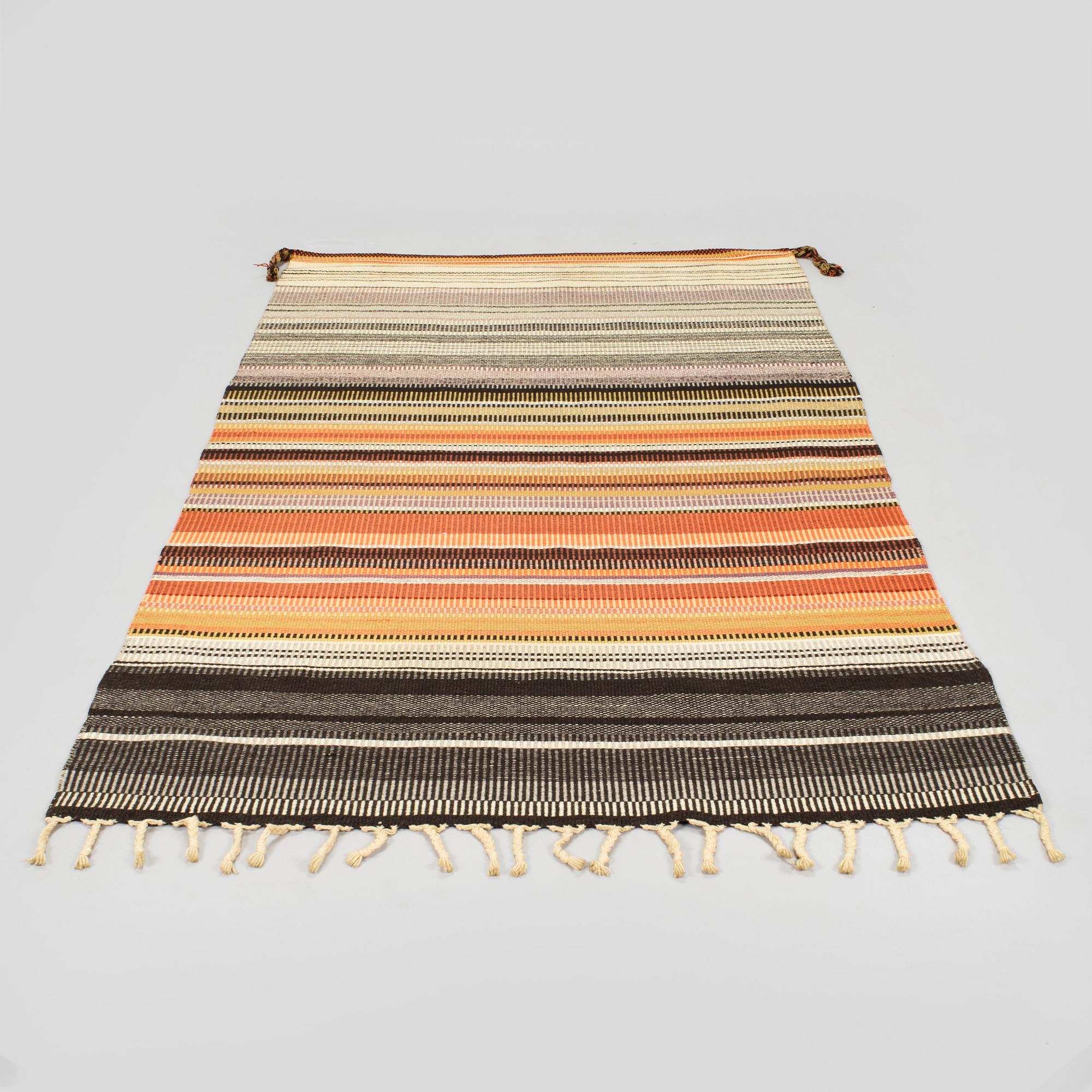 Elsa Montell-Saanio, a Raanu textile 'Campfire' from Lapland. Circa 180 x 113 cm.