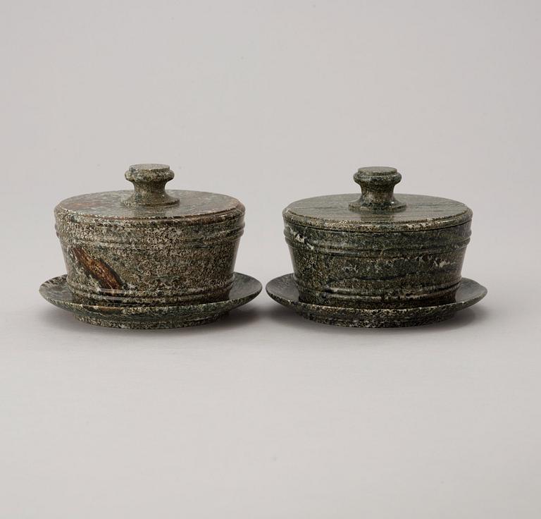 A pair of Swedish Empire 19th century green marble butter boxes.