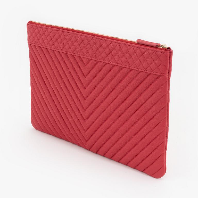 Chanel, a red leather clutch, 2017-2018.