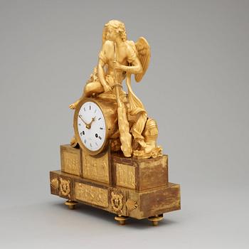 A French Empire early 19th century gilt bronze mantel clock.