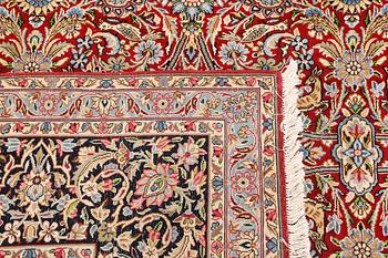 A Kirman lavar carpet, 403 x 304 cm.