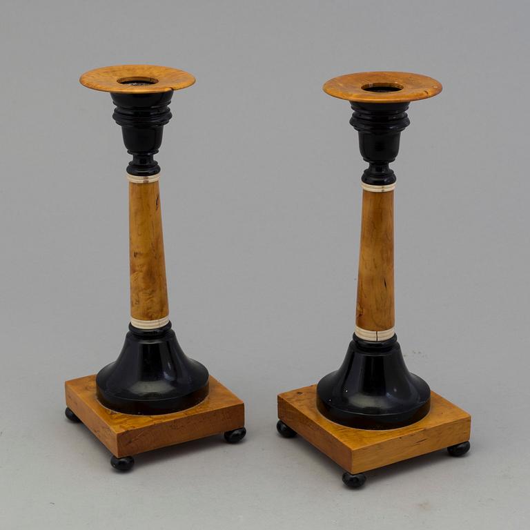 A pair of birch candles by Karl A Axelsson, konstsvarvare, Eksjö, 1907.