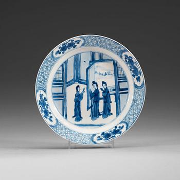 A set of four odd blue and white dinner plates, Qing dynasty, Kangxi (1662-1722), with different six character marks.