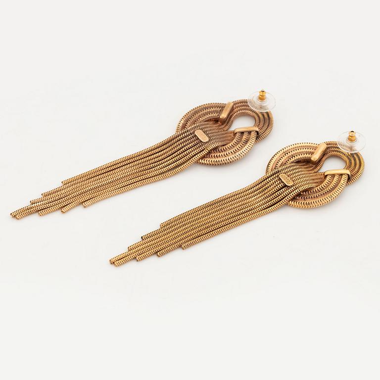 A pair of Lara Bohinc earrings.