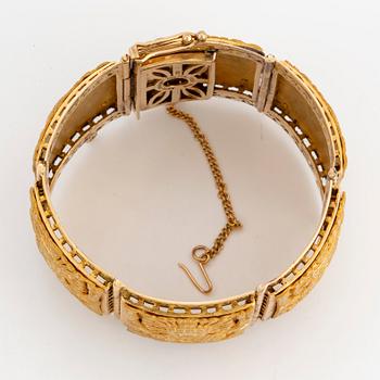 18K gold Peru bracelet.