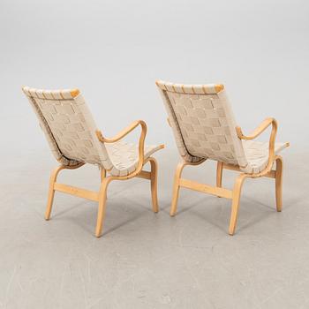 Bruno Mathsson, a pair of "Eva" armchairs for DUX, late 20th century.