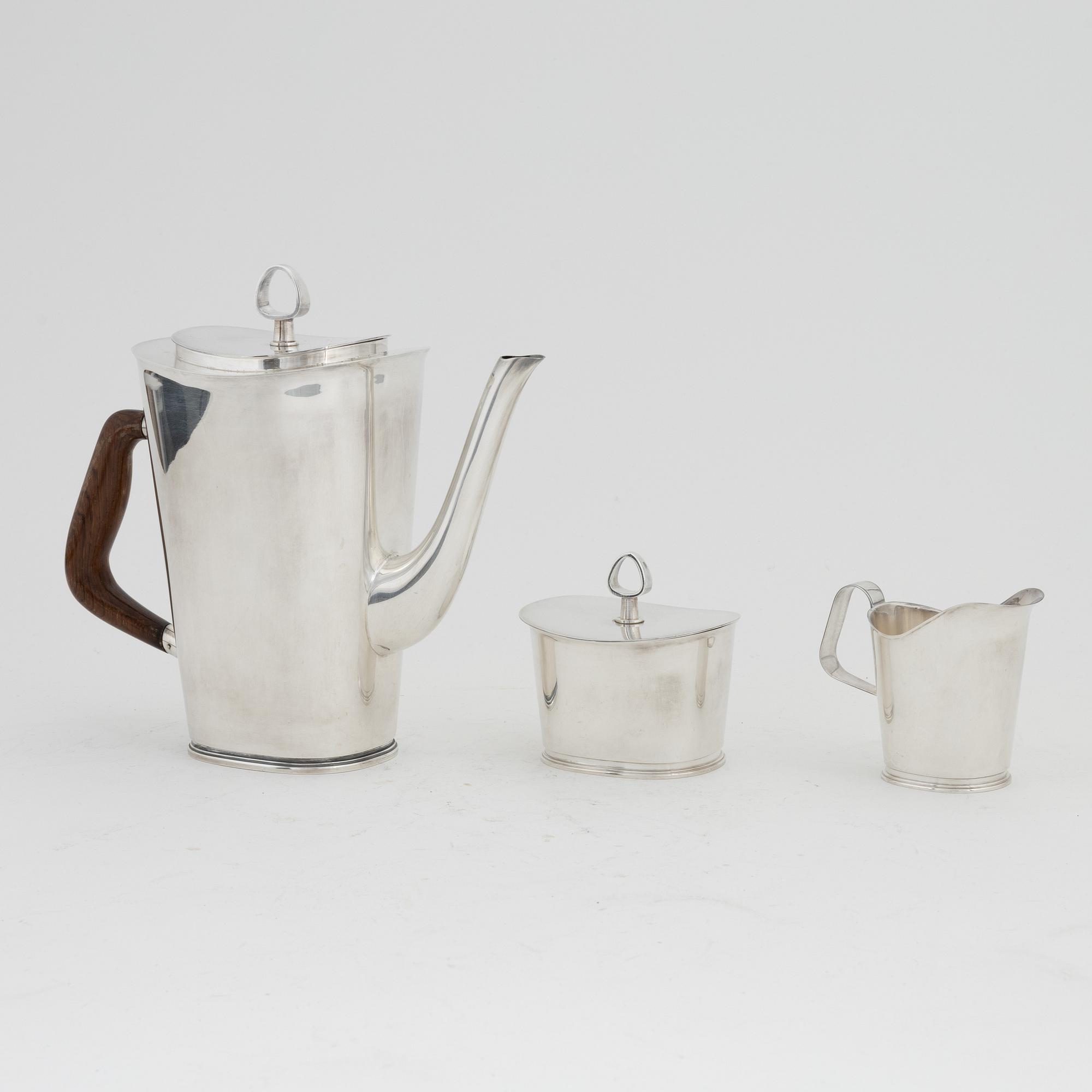 Vera Ferngren, a silver coffee pot, a lidded sugarbowl and a creamer, GAB, Stockholm, 1964-1965.