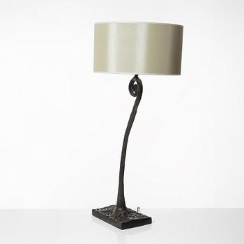 A bronze table lamp, circa 2000.