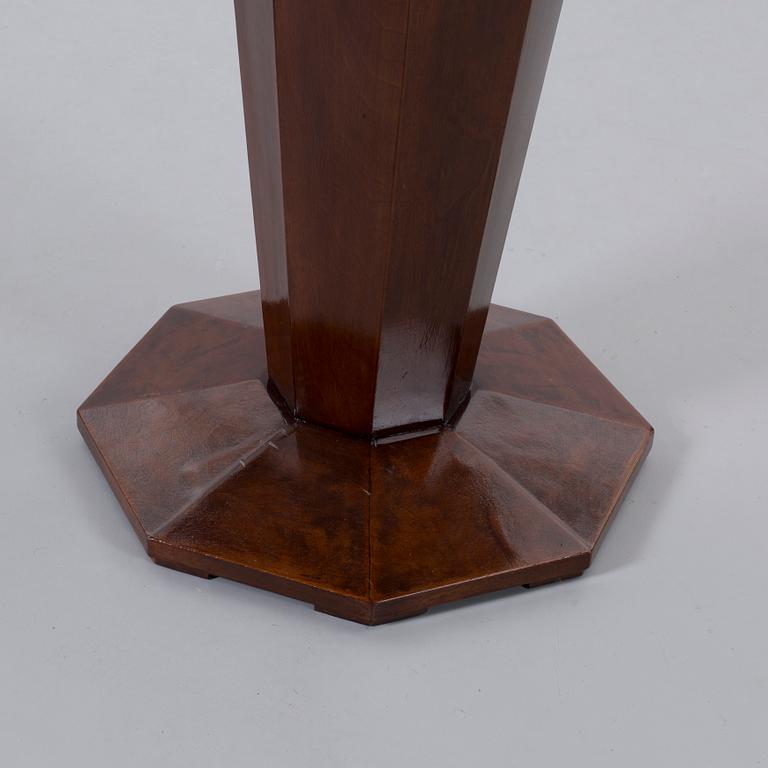AN ART DECO STYLE TABLE, from the middle of the 20th century.
