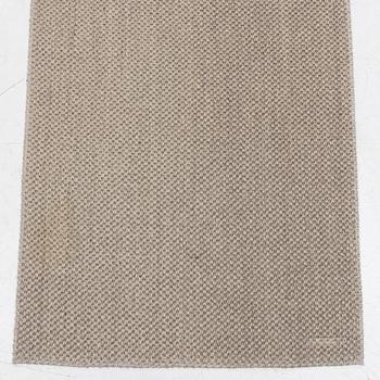 A runner carpet from NTK Atelier, Sweden, c. 448 x 87 cm.