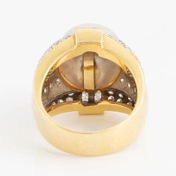 Cultured pearl and brilliant cut diamond ring.
