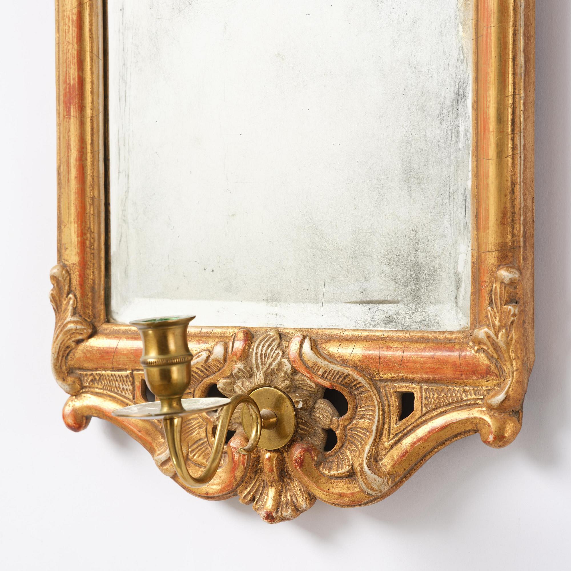 A pair of giltwood one-branch girandole mirrors by JP Larsson.