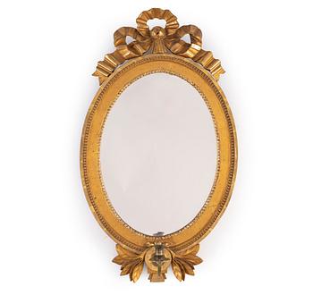 A 19th century gustavian style girandole mirror.