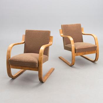 A PAIR OF 1940's ARMCHAIRS NO 34/402, Oy Huonekalu- ja Rakennustyötehdas Ab.