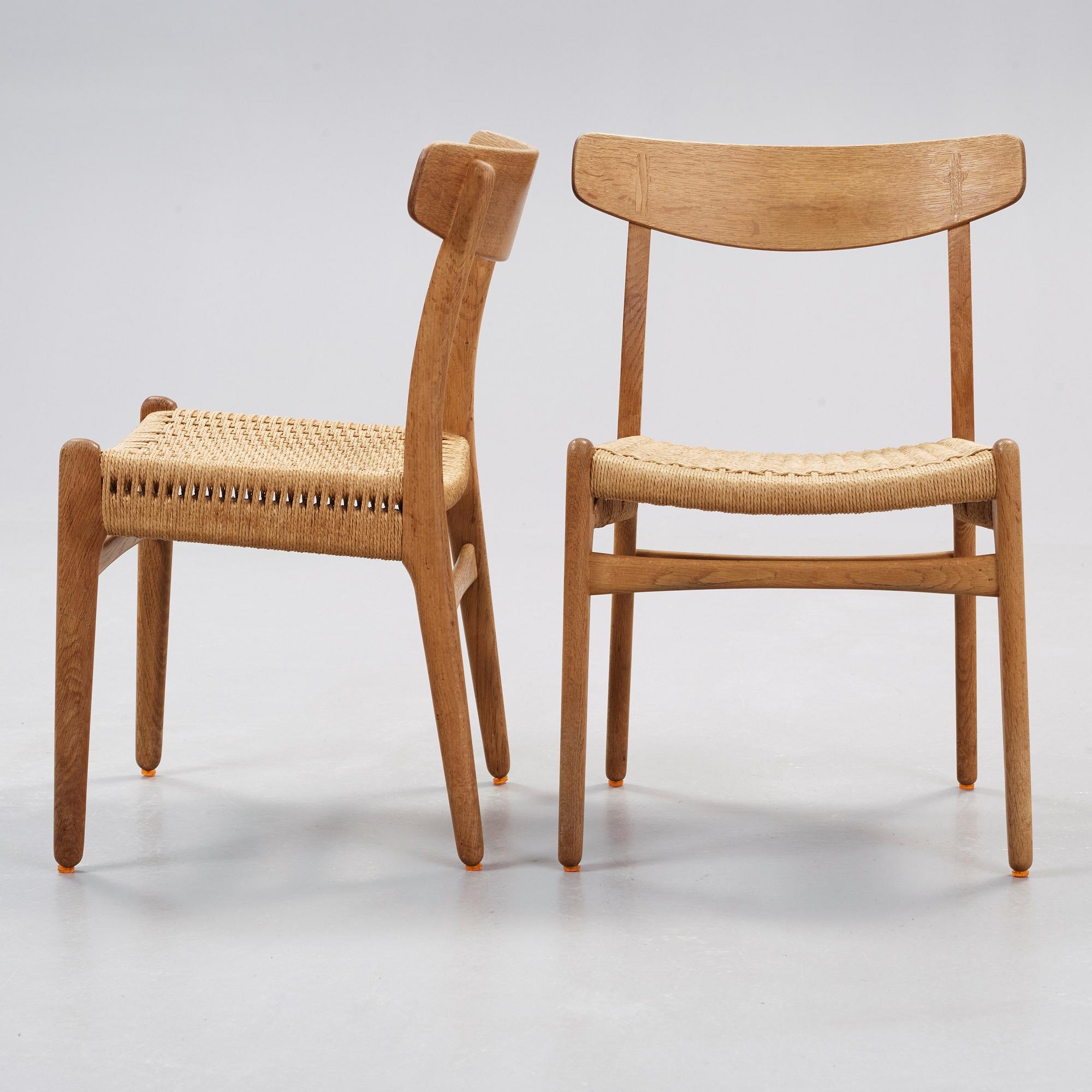 A set of six Hans J Wegner 'CH-23' oak dining chairs, Carl Hansen, Odense, Denmark.