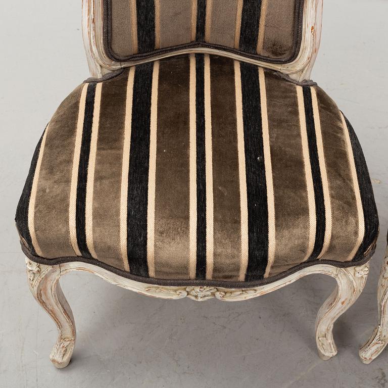 A matched set of six painted french rococo chairs, mid 18th Century.