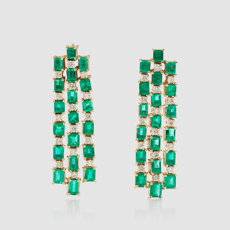 A pair of emarald and brilliant-cut diamond earrings.