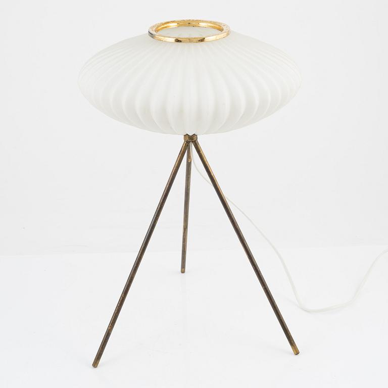 A glass and metal table lamp, probably Italy, 1960s.