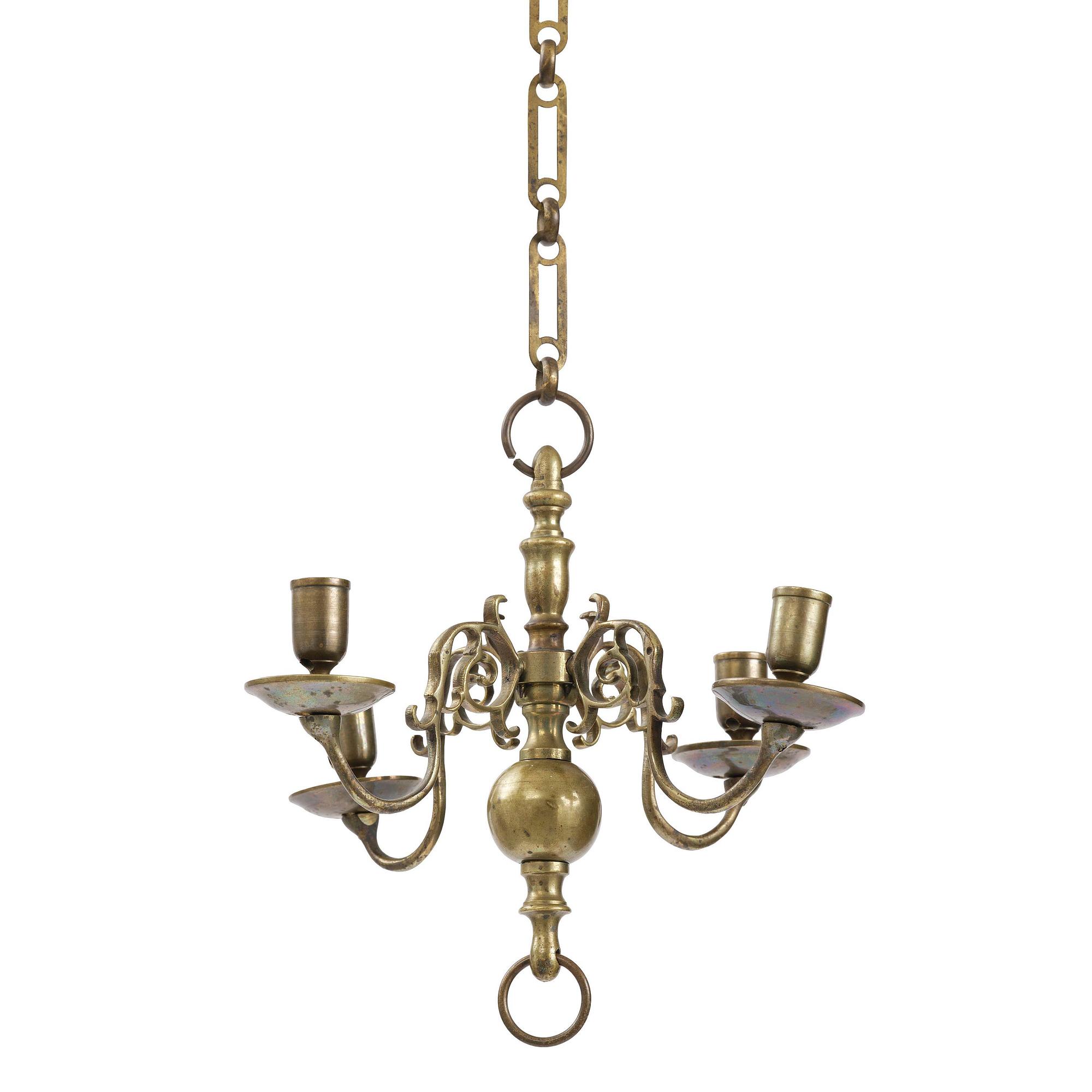 A four-branch baroque brass chandelier, late 17th century/circa 1700.