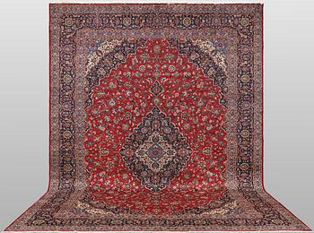 A Keshan carpet, signed, 435 x 315 cm.