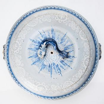 A round Swedish Rörstrand faience tureen with cover, dated 24/4 1752.