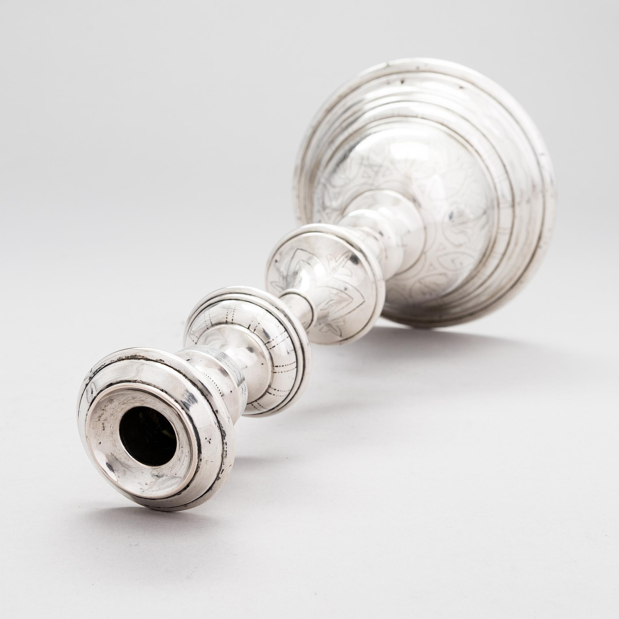 A Viennese silver candlestick, maker's mark CW, Austro-Hungarian Empire 1872-1922.