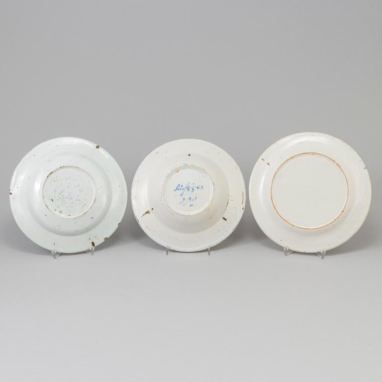 Three Swedish Faiance earthenware dishes, 18th century, one marked 'Rörstrand' and dated 1763.