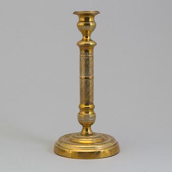 AN EMPIRE ORMOLU CANDLESTICK, first half of the 19th century.