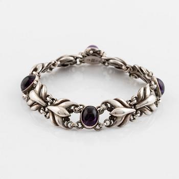 Georg Jensen, a silver bracelet set with cabochon-cut amethysts.