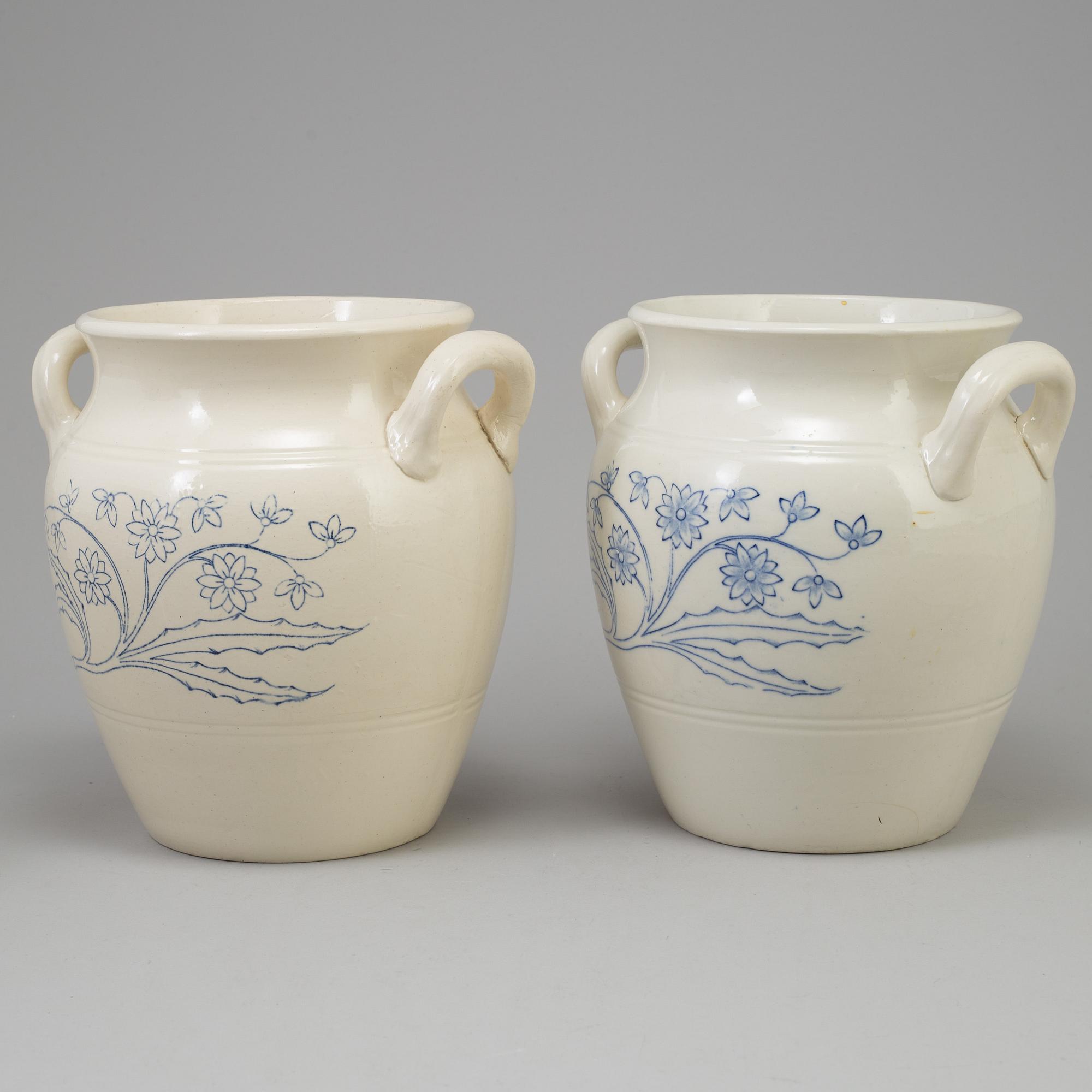 A set of four 20th century blue and white jars by Rörstrand.