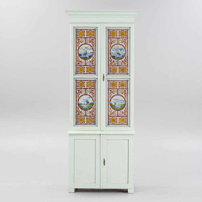 A painted cabinet, circa 1900.