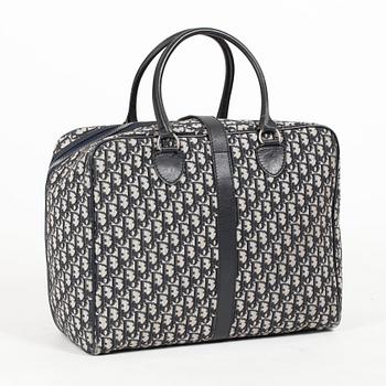 CHRISTIAN DIOR, a monogram canvas weekend bag.