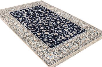 A part silk Nain rug, 9LA, c. 302 x 198 cm.