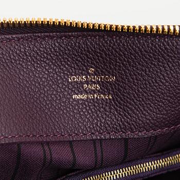 Louis Vuitton, a Monogram Empreinte 'Audacieuse' bag.